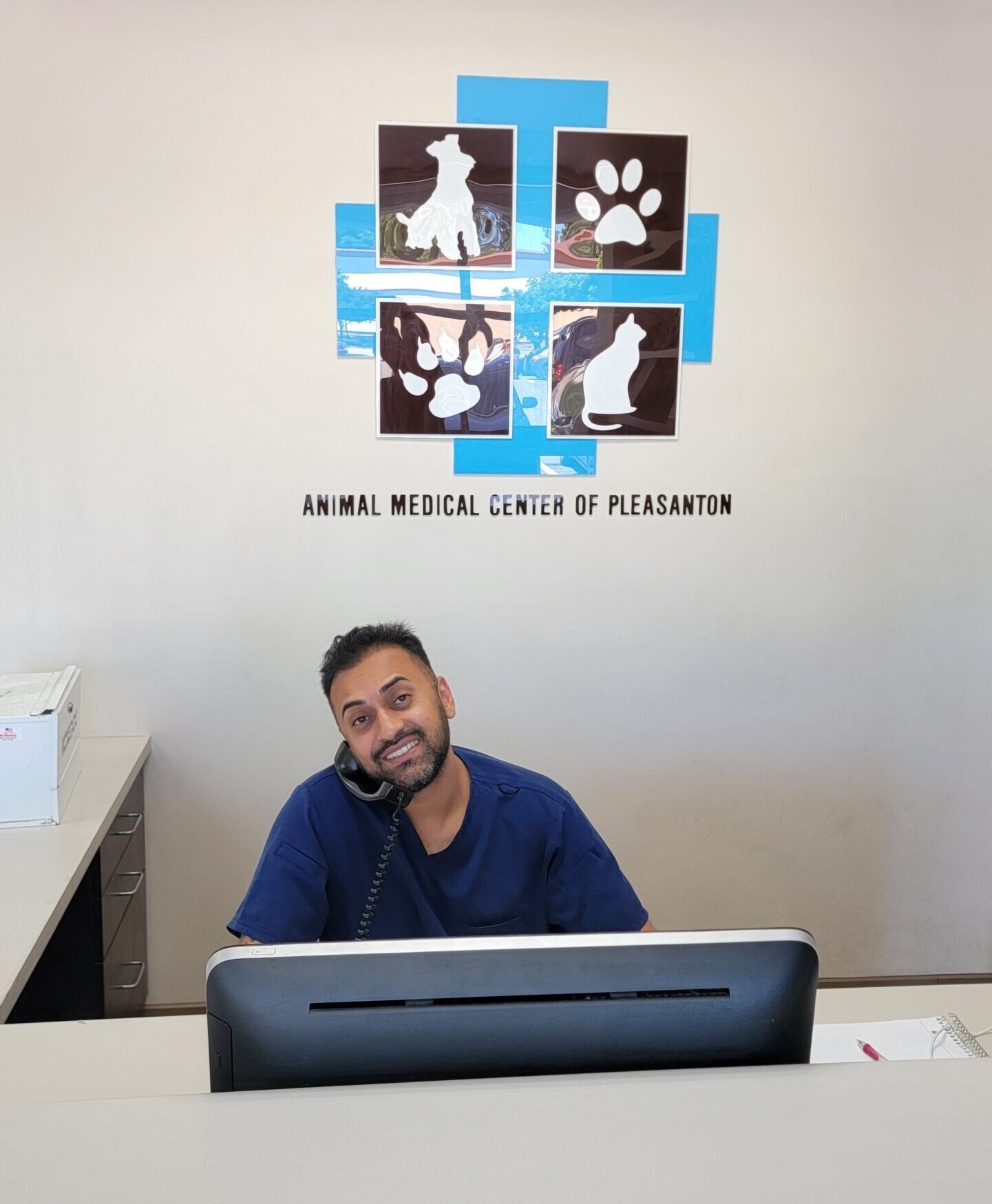 Veterinarian caring for pet at Animal Medical Center of Pleasanton